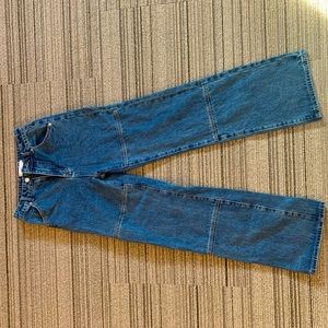 Brand new, never worn Adika long flared jeans!